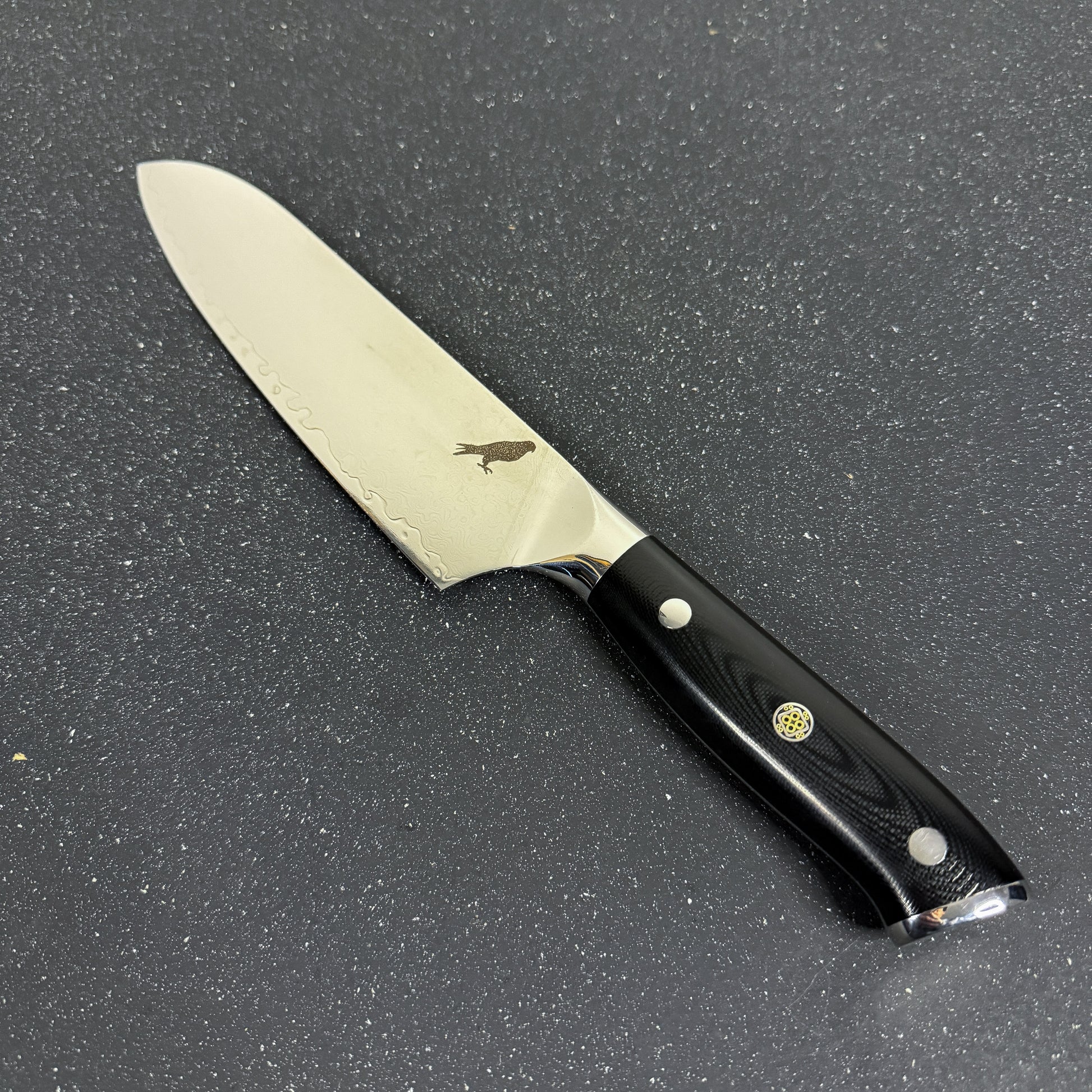 Cuchillo Santoku Rauka Tronador con hoja de acero Damasco y mango G10, ideal para cocina y parrilla