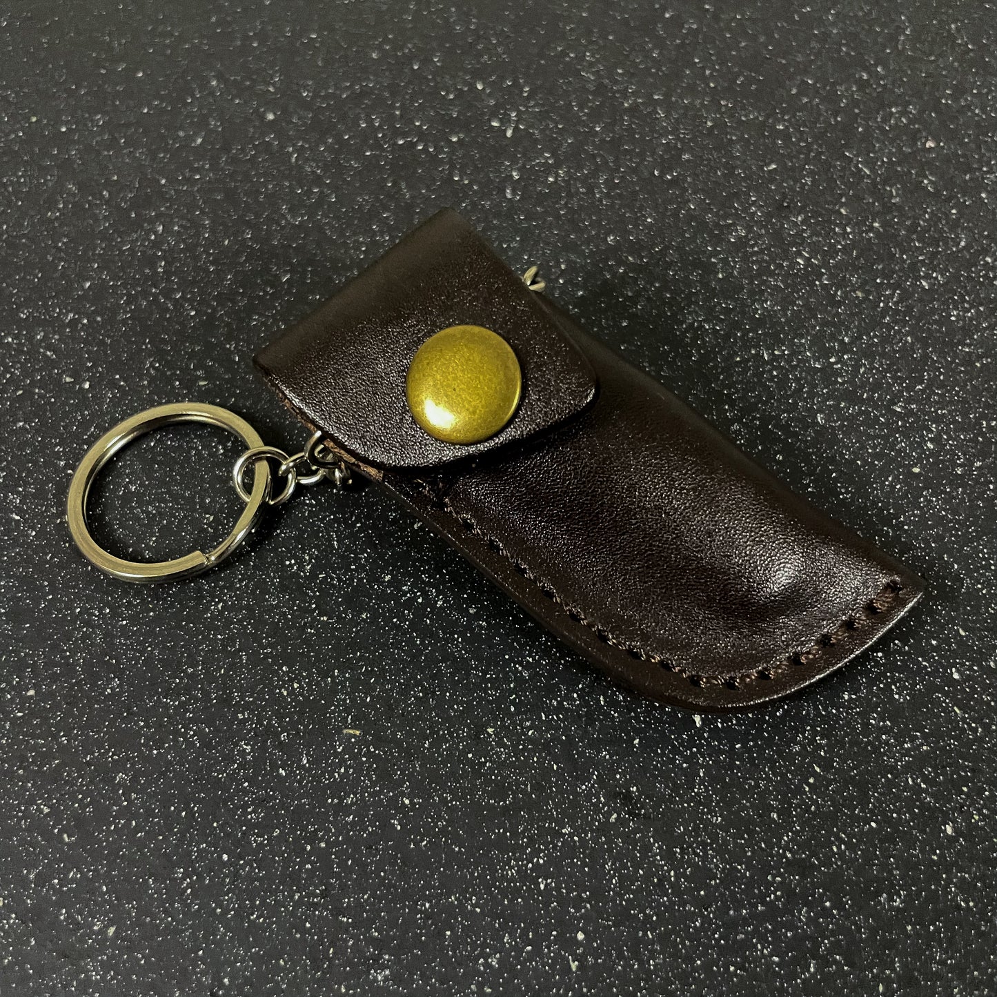 Funda de cuero incluida con Navaja Llavero de Acero Damasco 11cm “Conguillío“