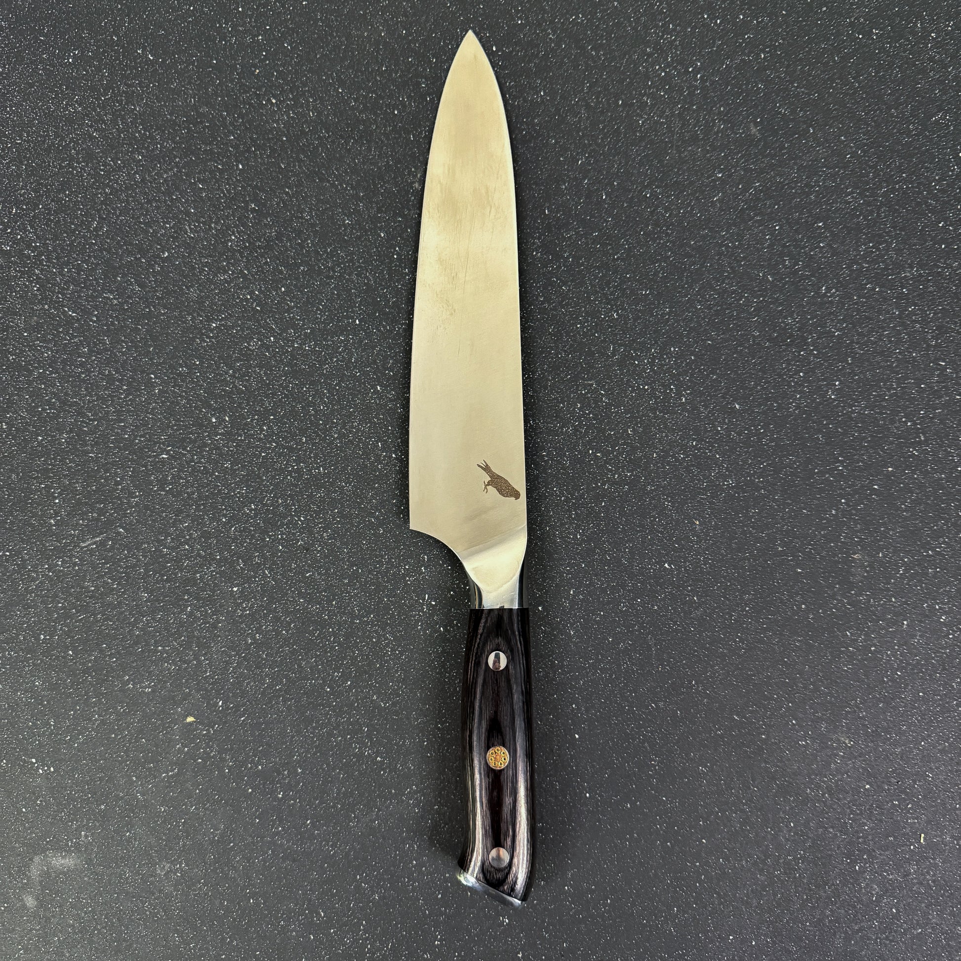 Cuchillo Chef Rauka Lascar con hoja de acero alemán y mango de madera Pakka, ideal para cocina y parrilla.