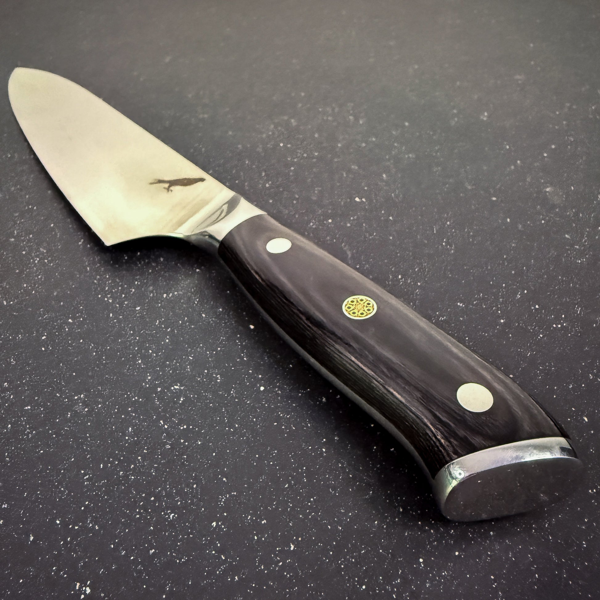 Cuchillo Chef Rauka Lascar con hoja de acero alemán y mango de madera Pakka, ideal para cocina y parrilla