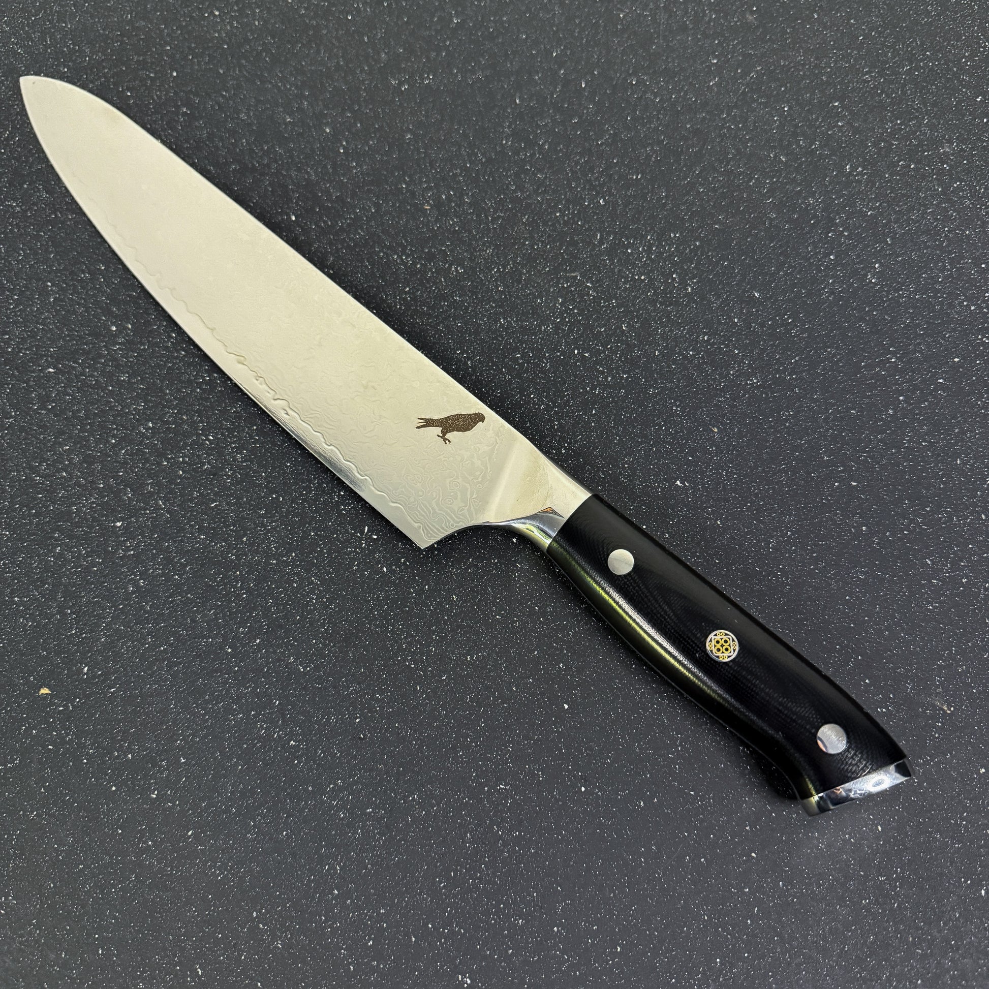 Cuchillo Chef Rauka Mate con hoja de acero Damasco y mango G10, perfecto para cocina y parrilla