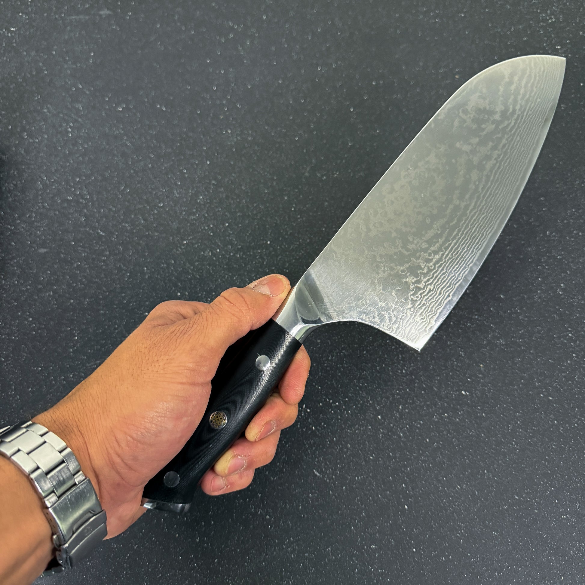 Cuchillo Cleaver Rauka Arenales con hoja de acero Damasco y mango G10, ideal para cortes potentes en cocina y parrilla