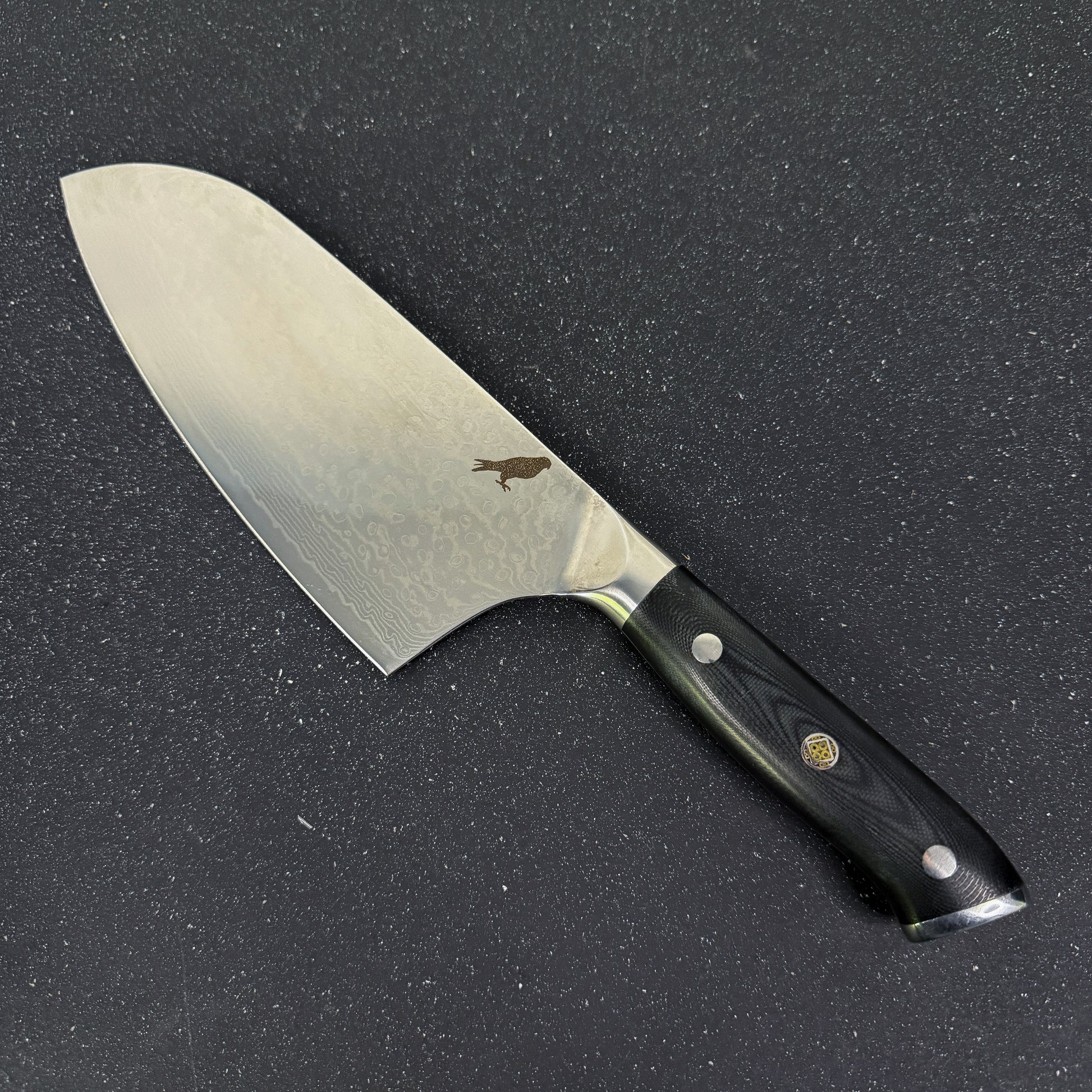 Cuchillo Cleaver Rauka Arenales con hoja de acero Damasco y mango G10, ideal para cortes potentes en cocina y parrilla