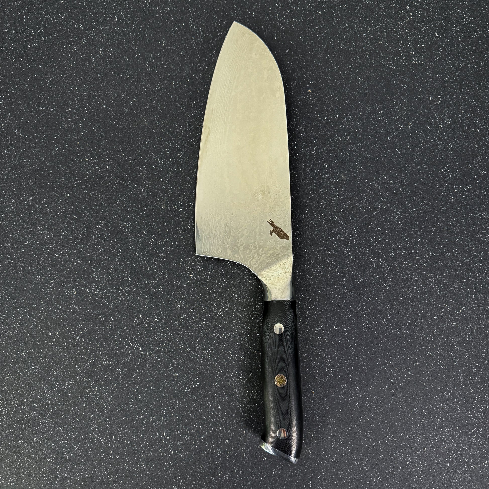 Cuchillo Cleaver Rauka Arenales con hoja de acero Damasco y mango G10, ideal para cortes potentes en cocina y parrilla