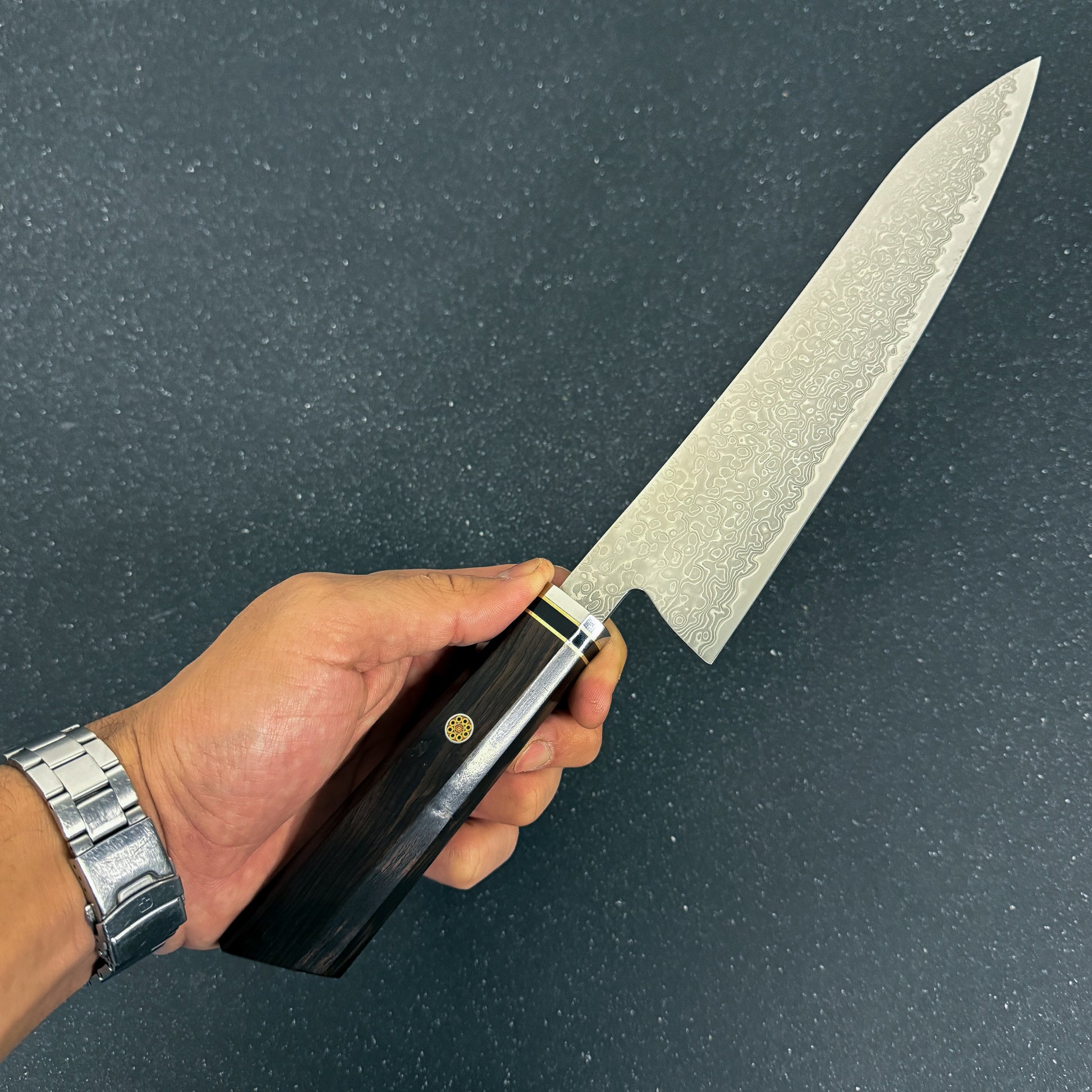 Cuchillo japonés Chef Rauka Taku con hoja de acero Damasco y mango de ébano, ideal para cocina y parrilla