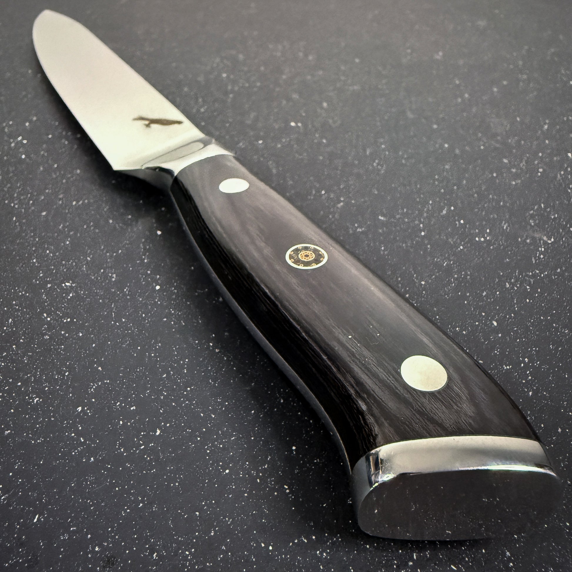 Cuchillo Slicing Rauka Copahue con hoja de acero alemán y mango de madera Pakka, ideal para cortes finos de carne