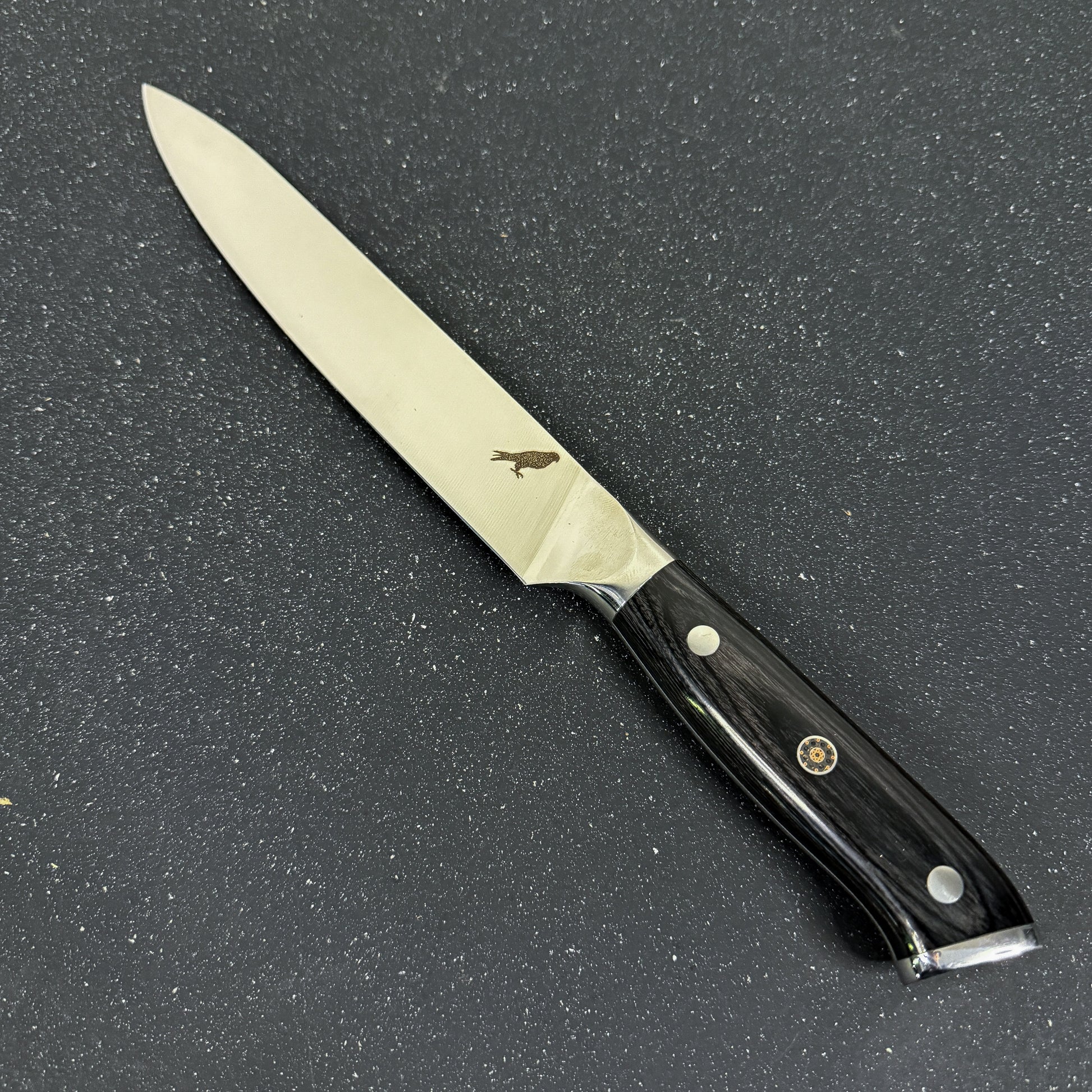 Cuchillo Slicing Rauka Copahue con hoja de acero alemán y mango de madera Pakka, ideal para cortes finos de carne