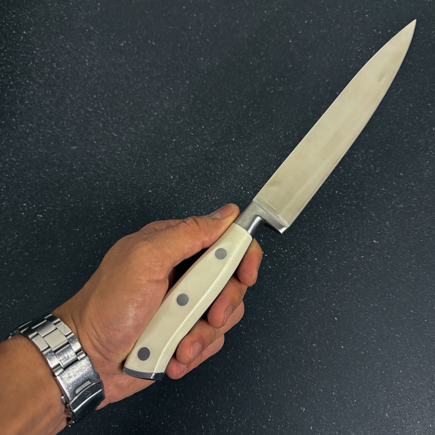 Cuchillo de cocina Rauka Pintor, slicing elegante y preciso para chefs y parrilleros. Calidad, control y estilo en cada rebanada.