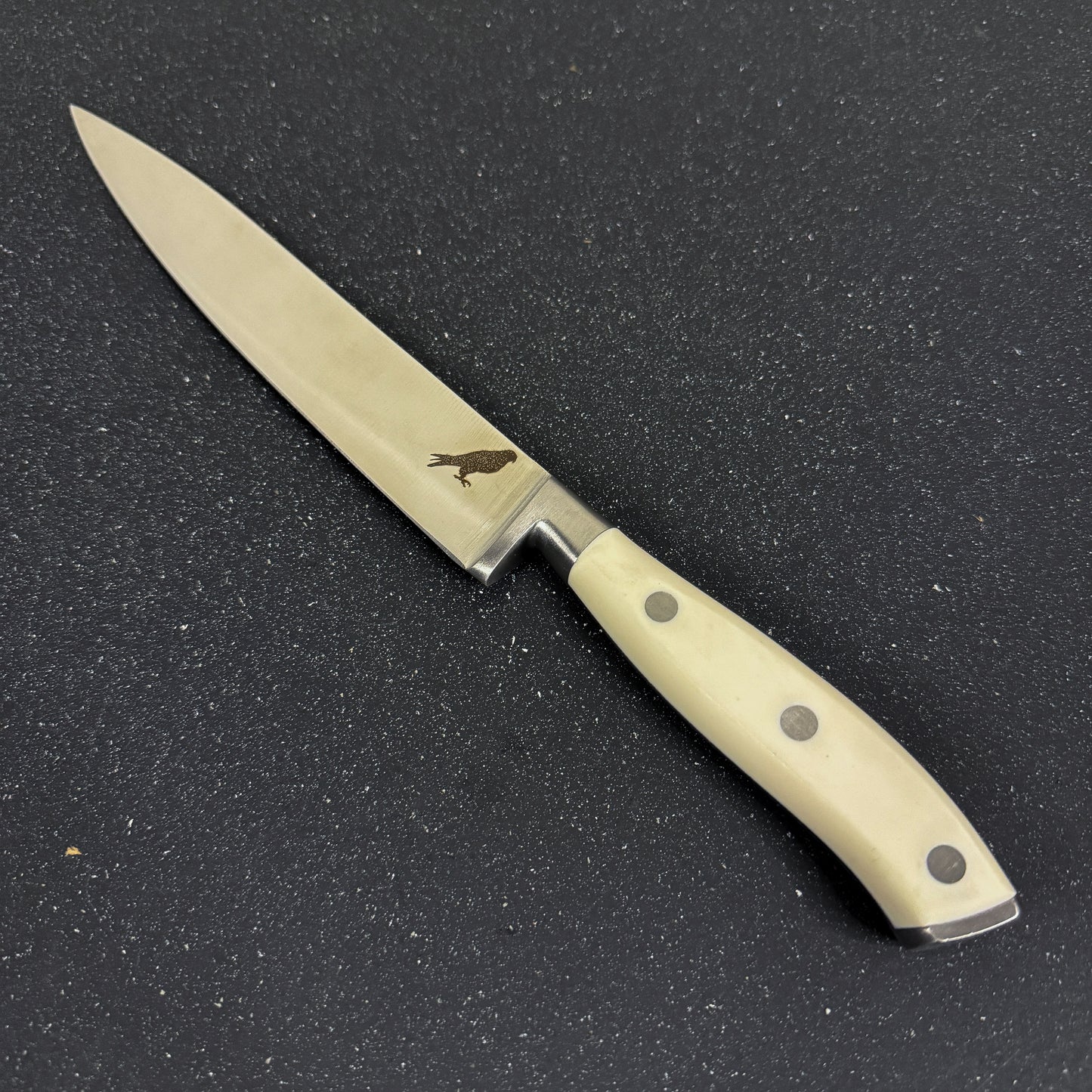 Cuchillo de cocina Rauka Pintor, slicing elegante y preciso para chefs y parrilleros. Calidad, control y estilo en cada rebanada.