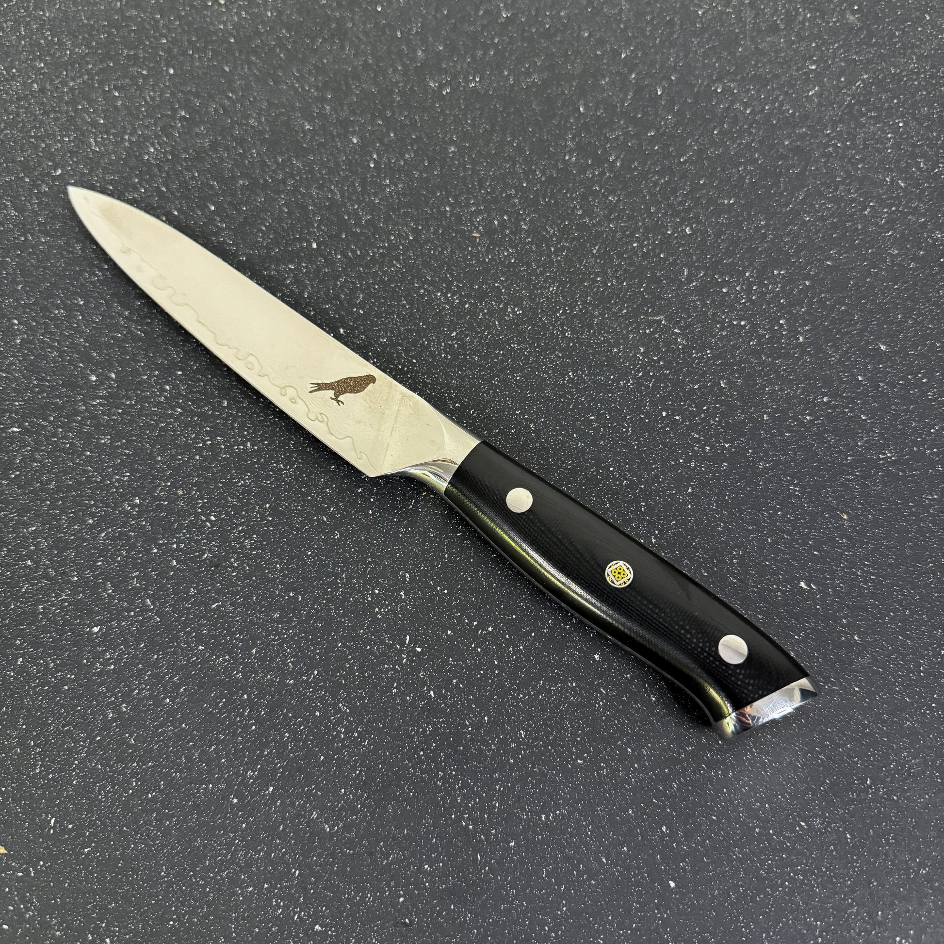 Cuchillo Utility Rauka Reclus con hoja de acero Damasco y mango G10, ideal para tareas precisas en cocina