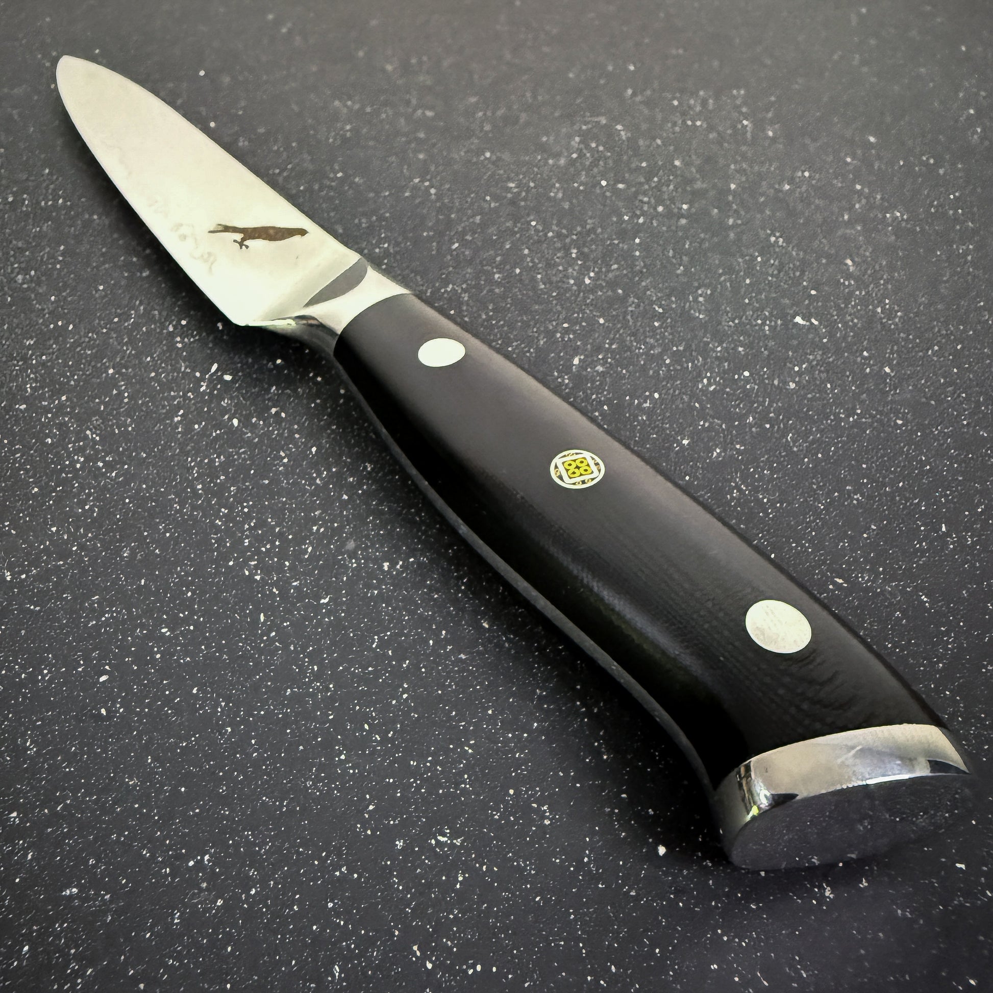 Cuchillo Utility Rauka Reclus con hoja de acero Damasco y mango G10, ideal para tareas precisas en cocina