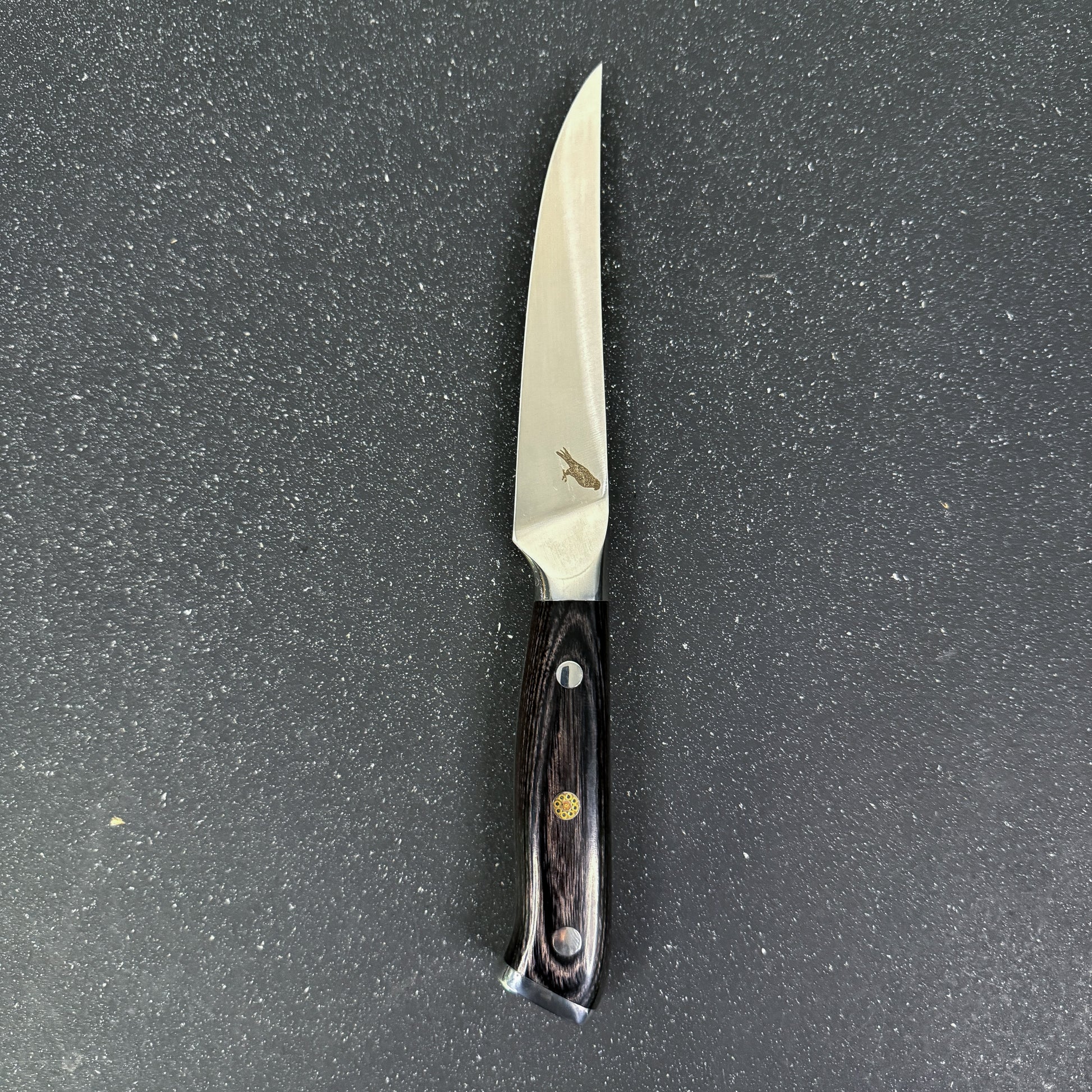 Cuchillo Steak Rauka Lautaro con hoja de acero alemán y empuñadura de madera Pakka para cocina profesional