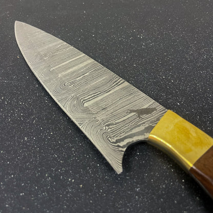 Detalle de cuchillo de cocina de acero damasco 32 cm Colico Rauka