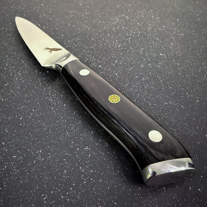 Cuchillo Paring Rauka Tolhuaca con hoja de acero alemán y mango de madera Pakka, ideal para cortes pequeños y precisos en cocina

