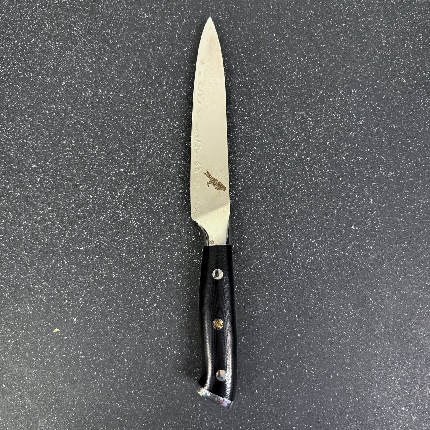 Cuchillo Utility Rauka Reclus con hoja de acero Damasco y mango G10, ideal para tareas precisas en cocina

