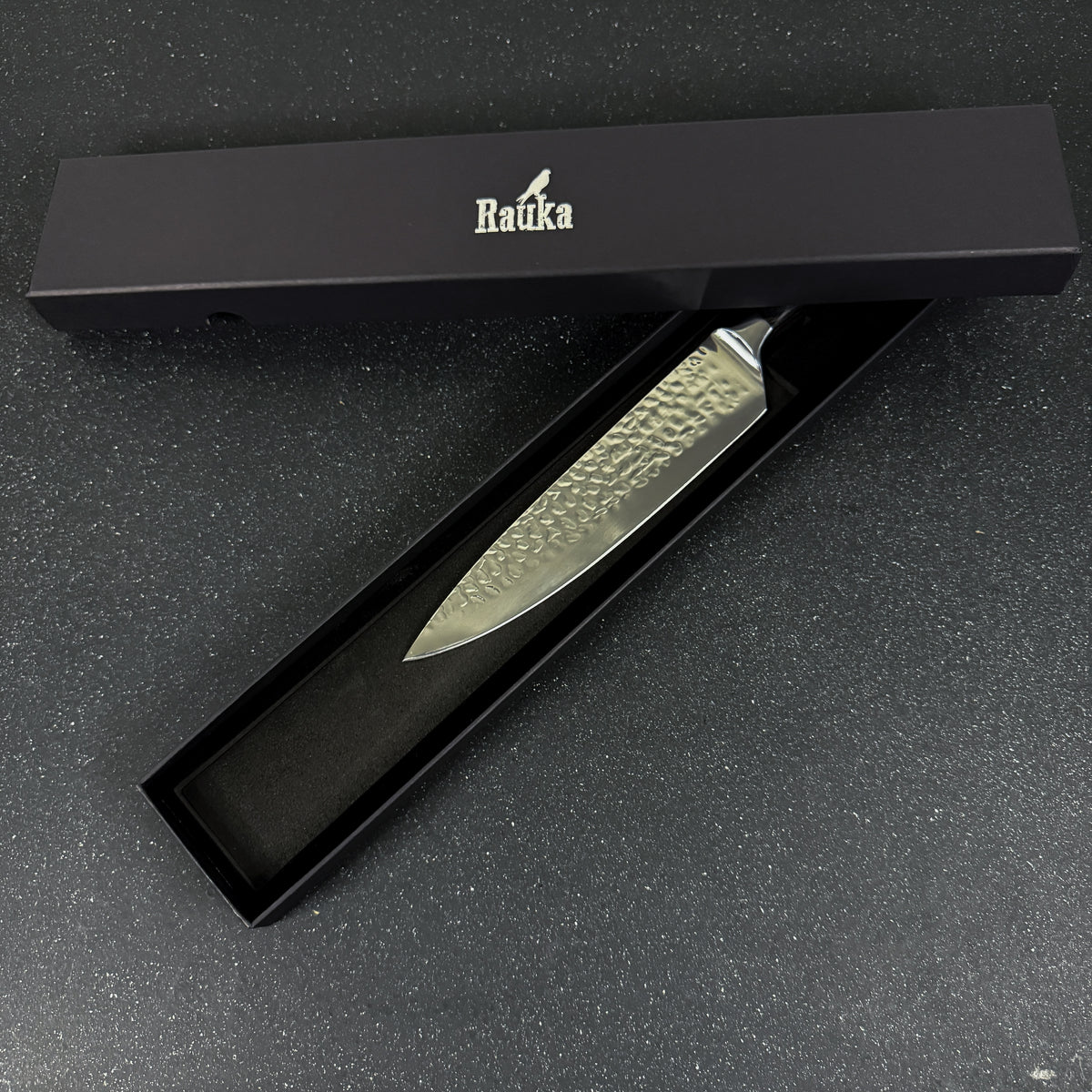 Vista lateral de cuchillo parrillero de acero inoxidable 33 cm Condor Rauka