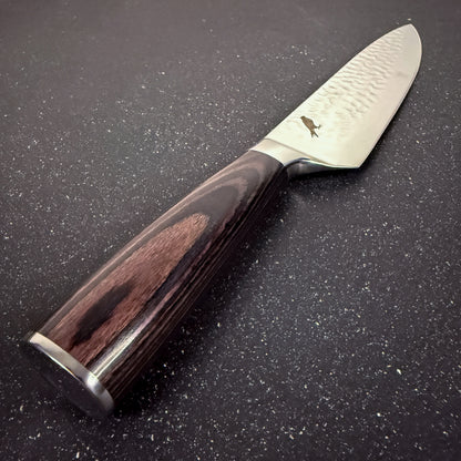 Detalle del mango de cuchillo parrillero de acero inoxidable 33 cm Condor Rauka