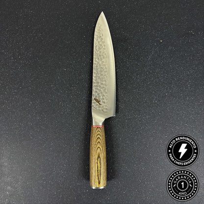 Cuchillo Parrillero de Acero Inoxidable 34 cm Huemul Rauka en uso, segunda foto