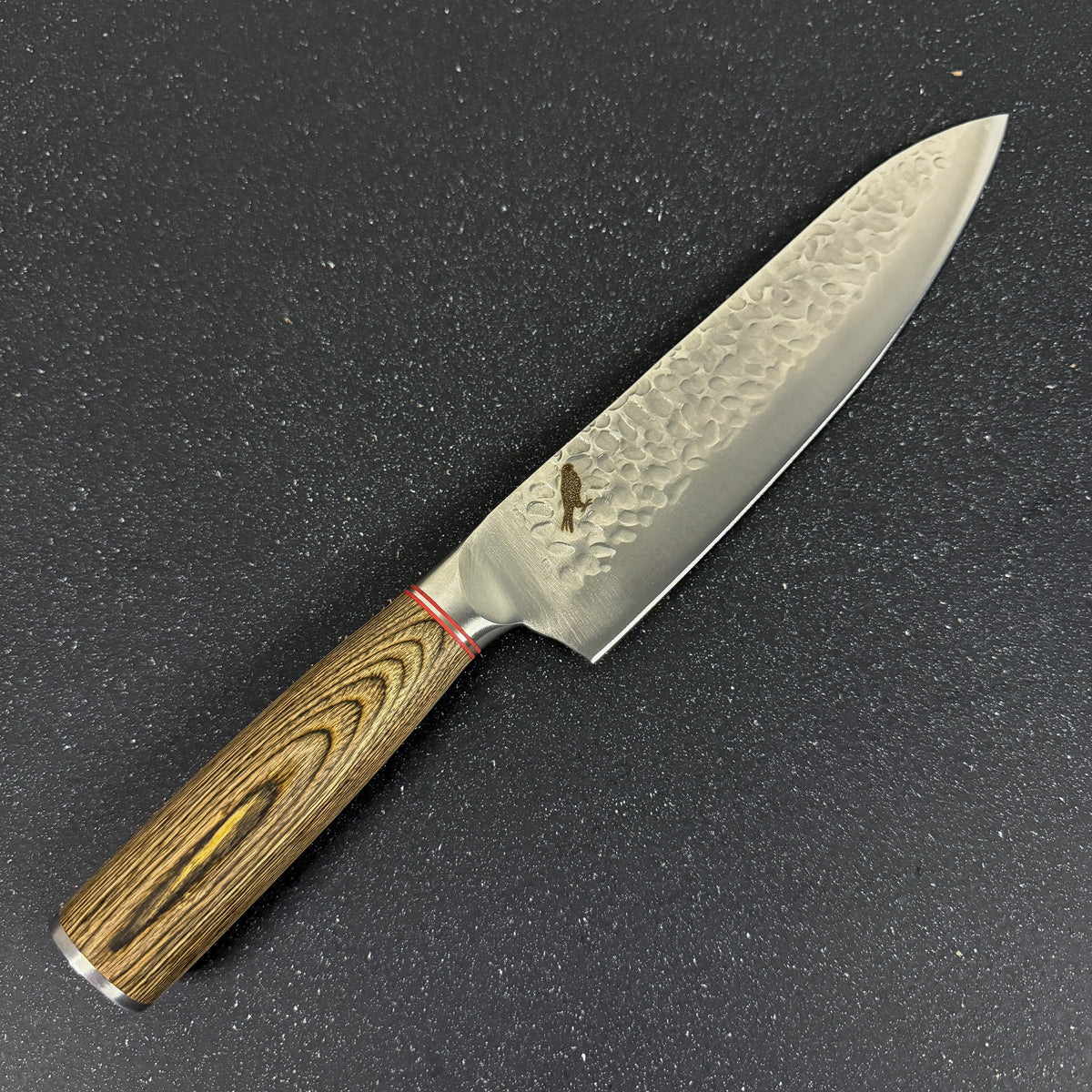 Detalle del filo de cuchillo parrillero de acero inoxidable 34 cm Huemul Rauka