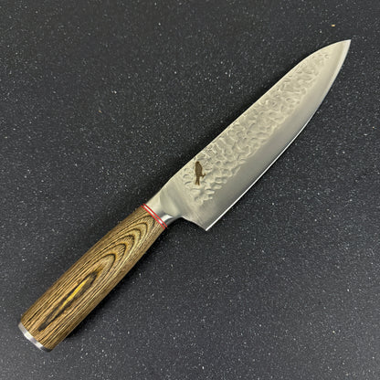 Detalle del filo de cuchillo parrillero de acero inoxidable 34 cm Huemul Rauka