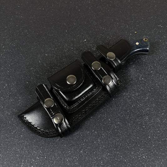 Vista lateral de cuchillo tracker de supervivencia 25 cm Torres del Paine Negro Rauka