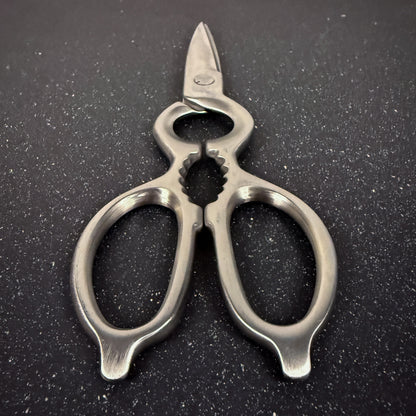 Detalle de tijeras profesionales de cocina 20 cm Rauka
